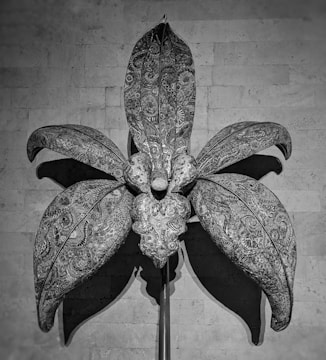 A giant opening flower showpiece unfolding with intricate detail.