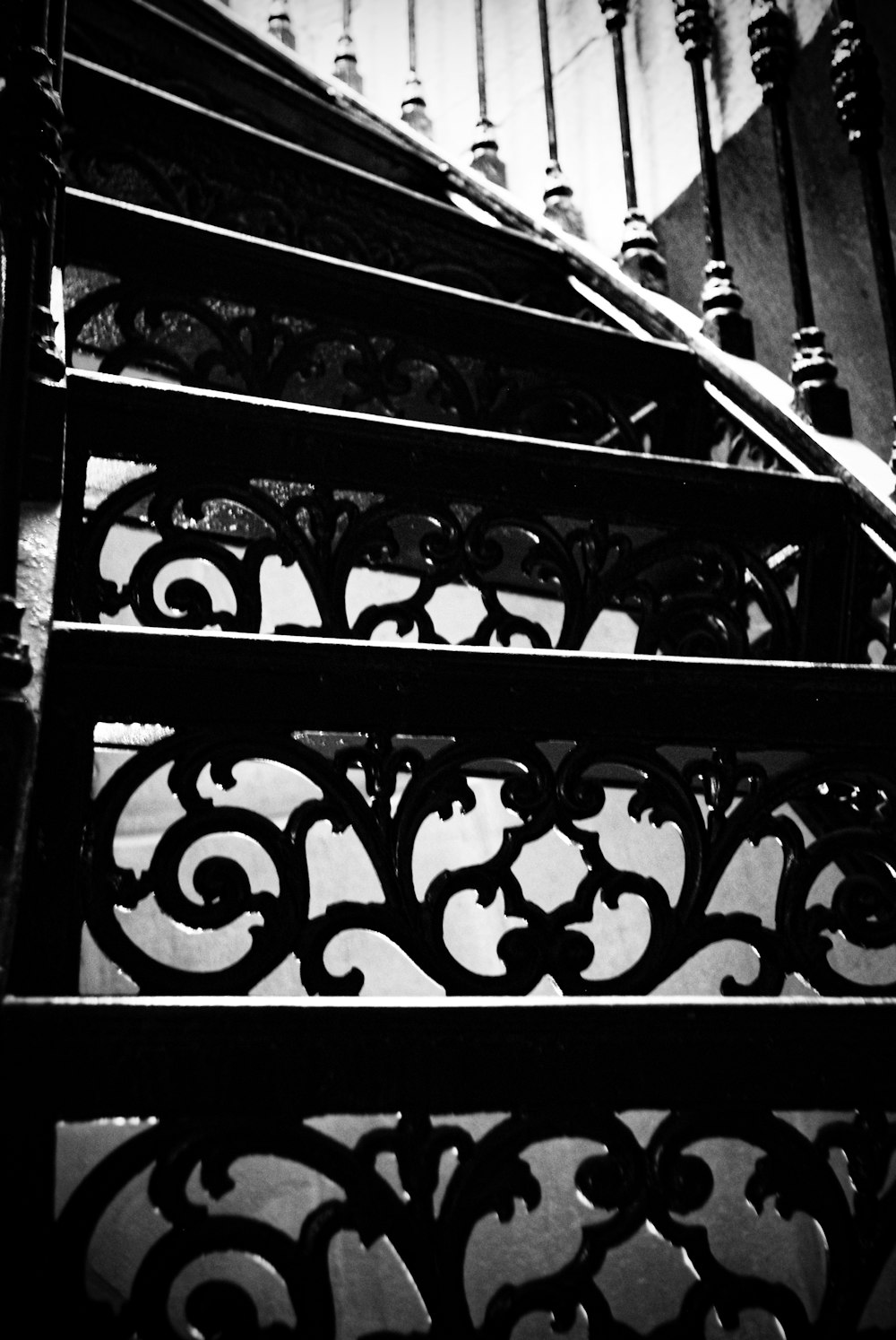 a black and white photo of a stair case