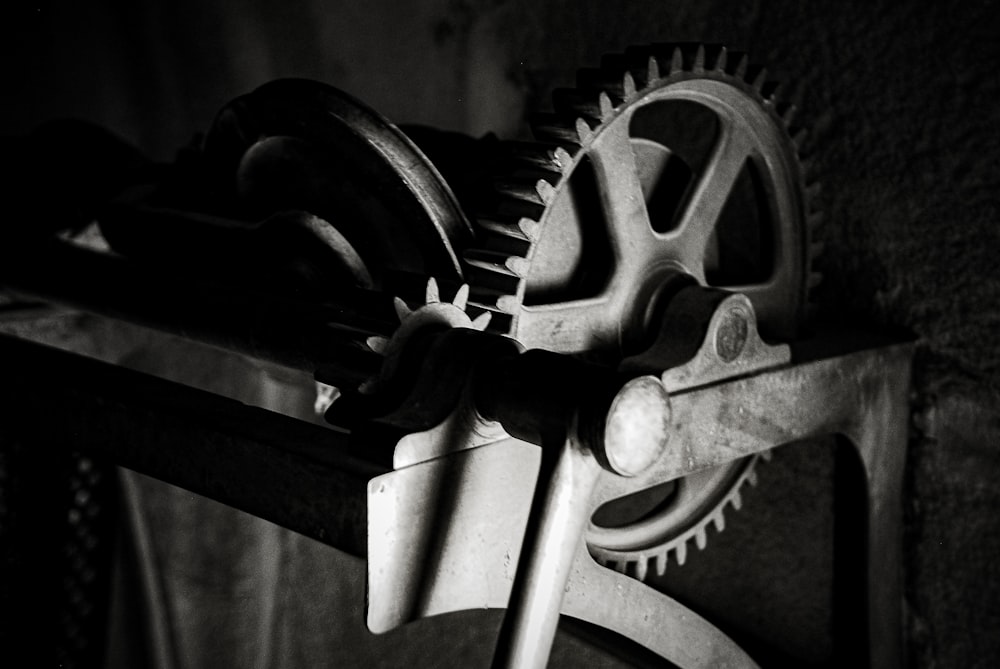 a black and white photo of a clock mechanism