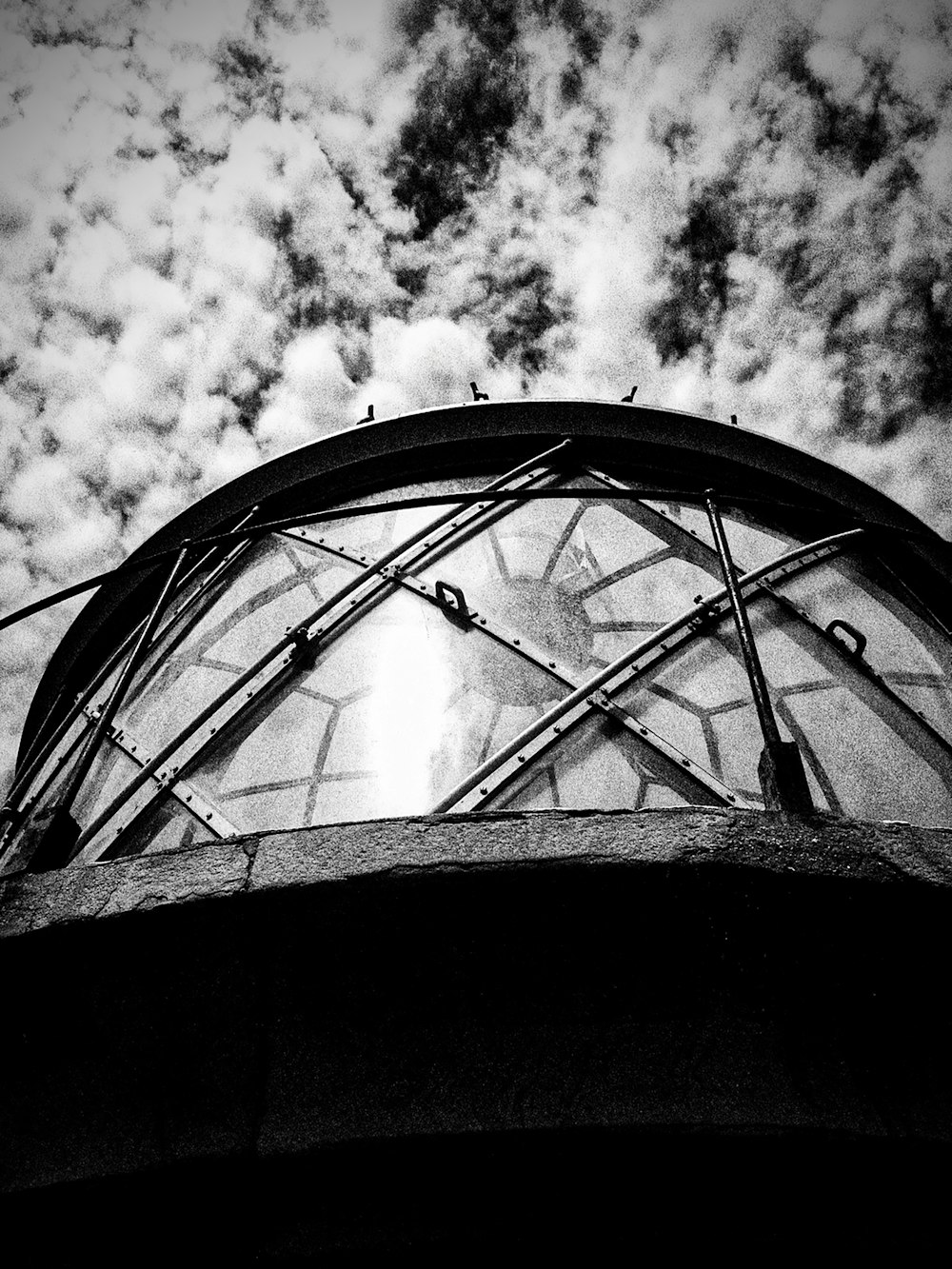 a black and white photo of a clock tower