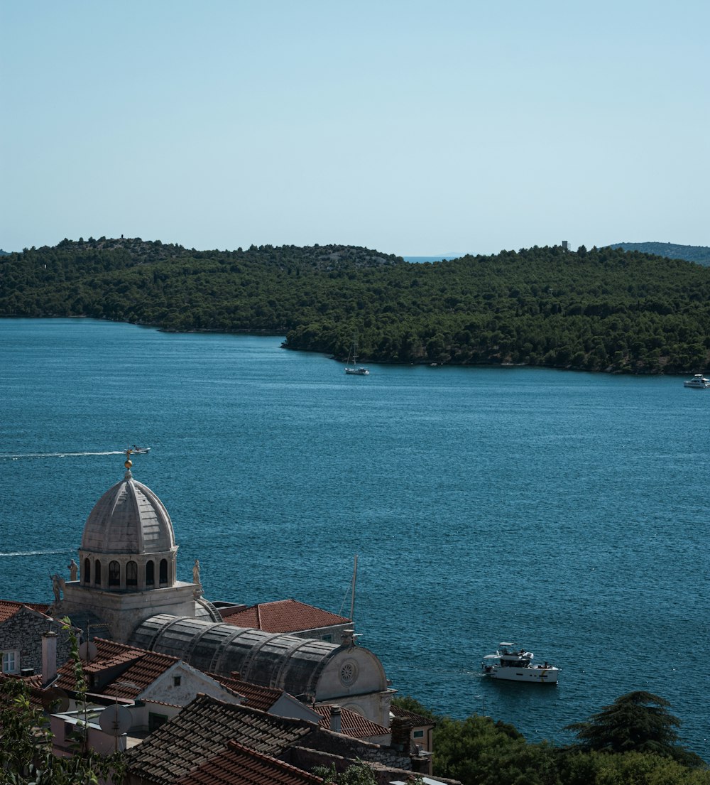 a large body of water surrounded by trees