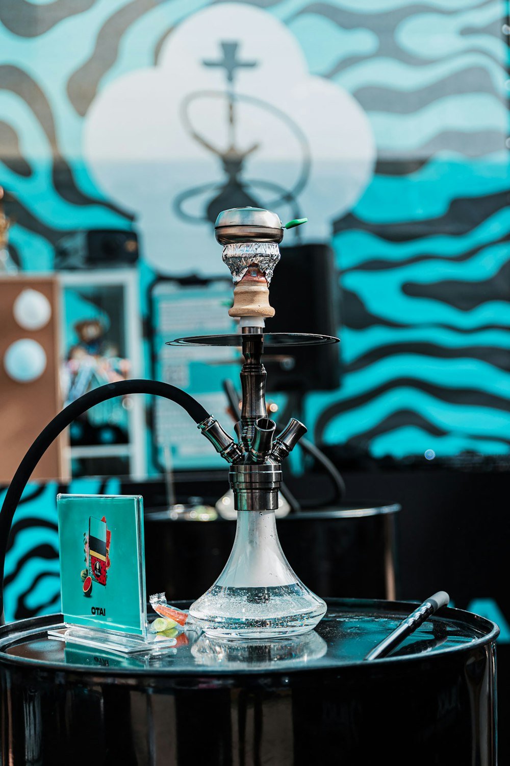 a hookah sitting on top of a glass table