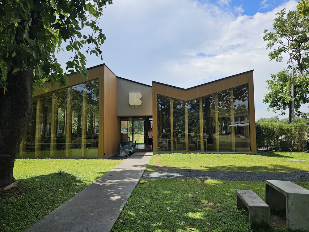 a large building with a walkway leading to it