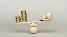 a scale with stacks of coins on it