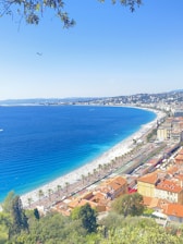 A collage of vibrant destinations including beaches, mountains, and cityscapes.