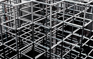 a bunch of metal structures that are stacked together