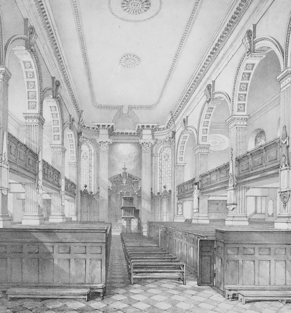 The image depicts a grand, ornate church interior with high ceilings and intricate architectural details. The ceiling features a large circular design at its center, adding to the overall elegance of the space. The walls are adorned with numerous columns and arches, showcasing the craftsmanship and attention to detail in the building's construction.

The church is filled with rows of wooden pews arranged neatly on either side of the aisle, facing towards a large stained glass window that dominates one wall. The floor is covered in white tiles, providing a clean and polished appearance. The image is rendered in black and white, highlighting the architectural features and adding depth to the scene.