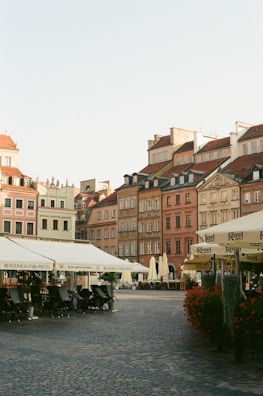 An outdoor shot of an interview taking place in a charming old town square.