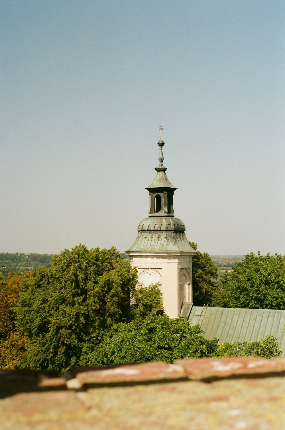 a tall tower with a clock on top of it