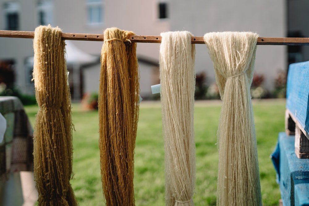 a line of yarn hanging from a clothes line