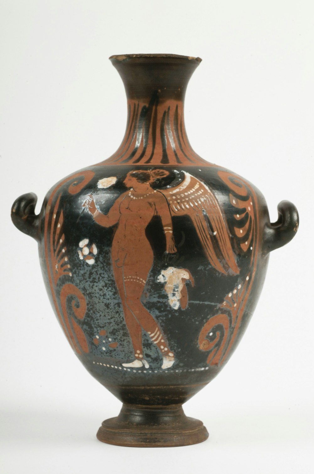 a black and red vase with a bird on it