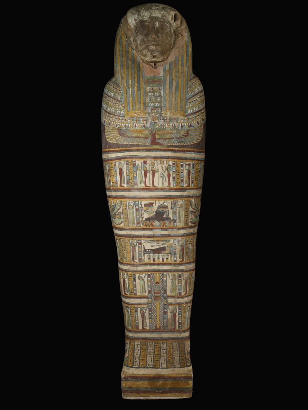 Eine ägyptische Statue eines ägyptischen Gottes auf schwarzem Hintergrund