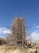 Historic monument site surrounded by scaffolding during renovation.