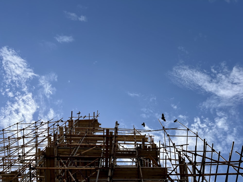 a building under construction under a blue sky