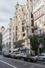 a city street filled with lots of tall buildings