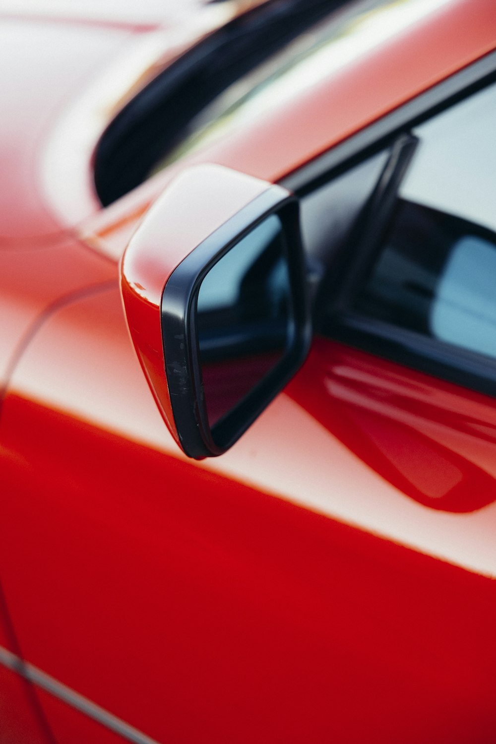 a close up of a car's side mirror