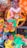 A vibrant display of various Halloween costumes and accessories on a colorful backdrop.