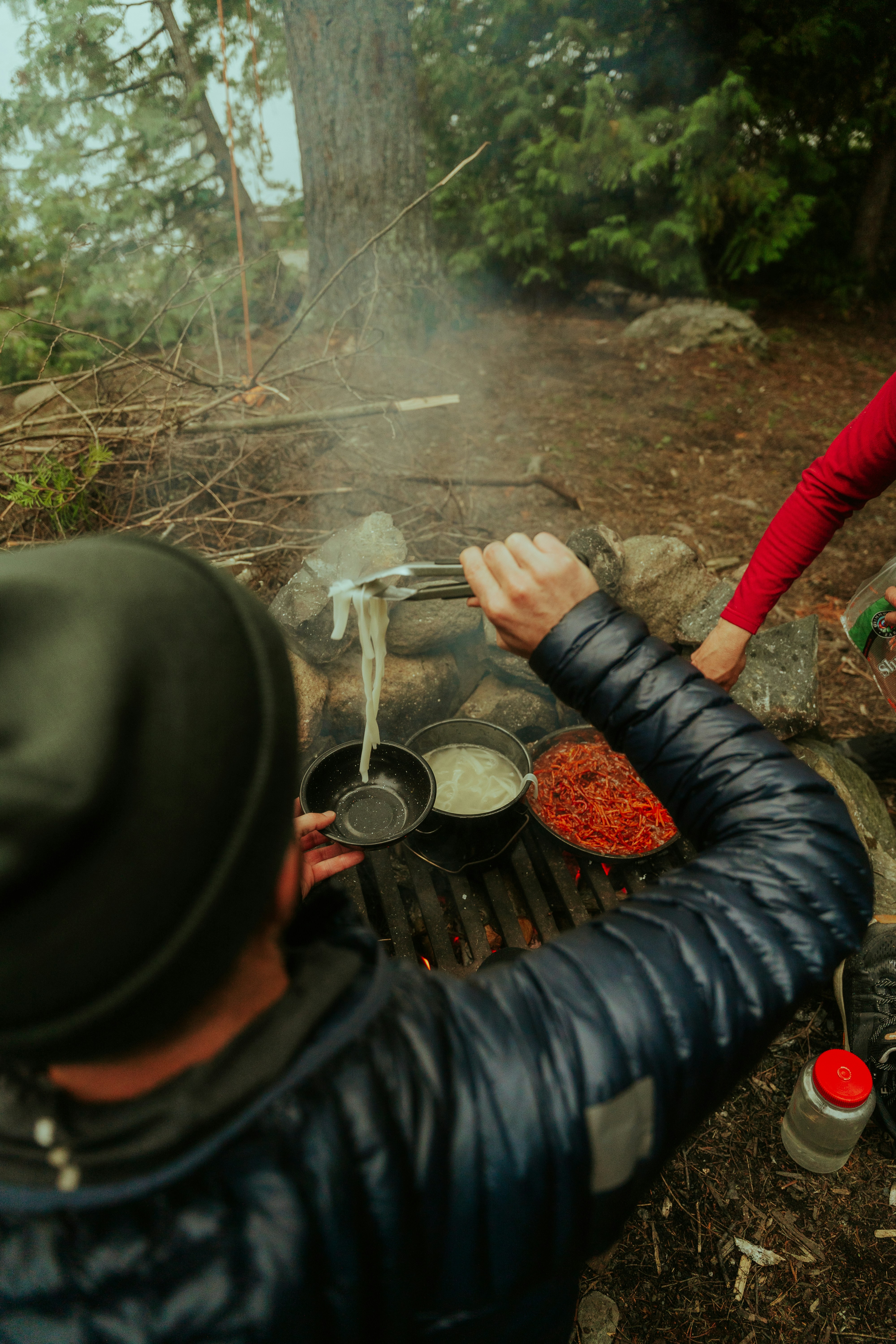 cooking meals over a fire pit
