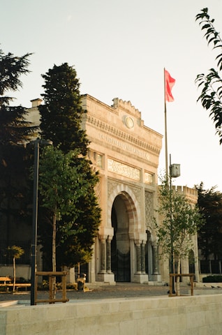 a large building with a flag on top of it