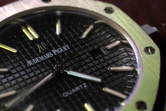 a close up of a watch on a table