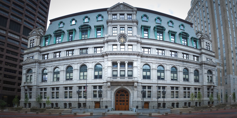 a large building with a clock on the front of it