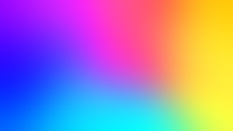A smooth gradient with a transition of vibrant colors ranging from purple to blue, moving through pink, red, and finally yellow. The colors blend seamlessly into one another, creating a soothing and visually pleasing effect.