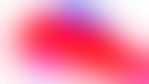 A vibrant abstract background with a blend of colors creating a gradient effect. The center features a prominent red hue that smoothly transitions into purple, pink, and blue, ultimately fading into a soft white at the edges.