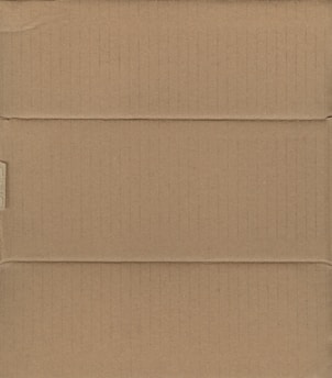 A brown cardboard box, closed and laid flat, with visible creases and slight shadows indicating the box's structure with its intersecting flaps.