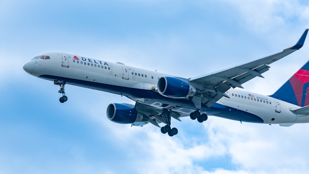 a delta airlines plane flying in the sky