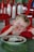 Close-up of a smiling customer enjoying a meal at a restaurant table.