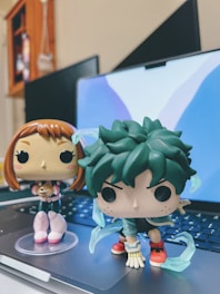 Illustration of two pixelated characters representing Kobi and Ofir.