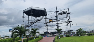 Wide shot of a fabricated obstacle course setup in an outdoor extreme sports environment.