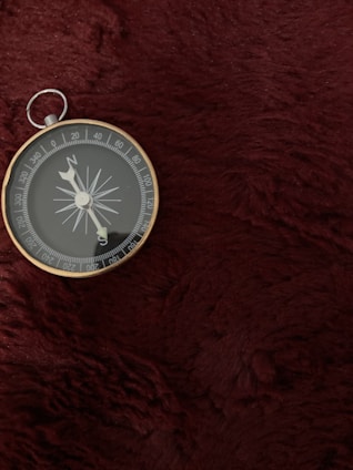 A serene compass resting on an open map, symbolizing guidance.