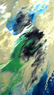 A dynamic abstract painting featuring swirling patterns. The artwork incorporates a mix of vibrant blues, rich greens, and soft earthy tones, with black accents creating a sense of depth and movement. The textures appear fluid, resembling the movement of water or clouds.
