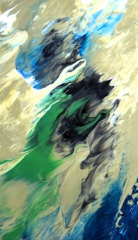 A dynamic abstract painting featuring swirling patterns. The artwork incorporates a mix of vibrant blues, rich greens, and soft earthy tones, with black accents creating a sense of depth and movement. The textures appear fluid, resembling the movement of water or clouds.