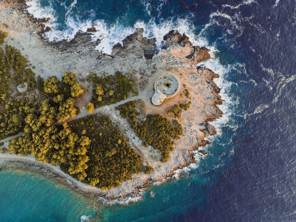 an aerial view of an island in the middle of the ocean