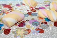 Victory celebration with marshmallow characters cheering and confetti flying.