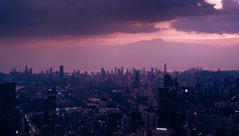 a view of a city at night from a tall building