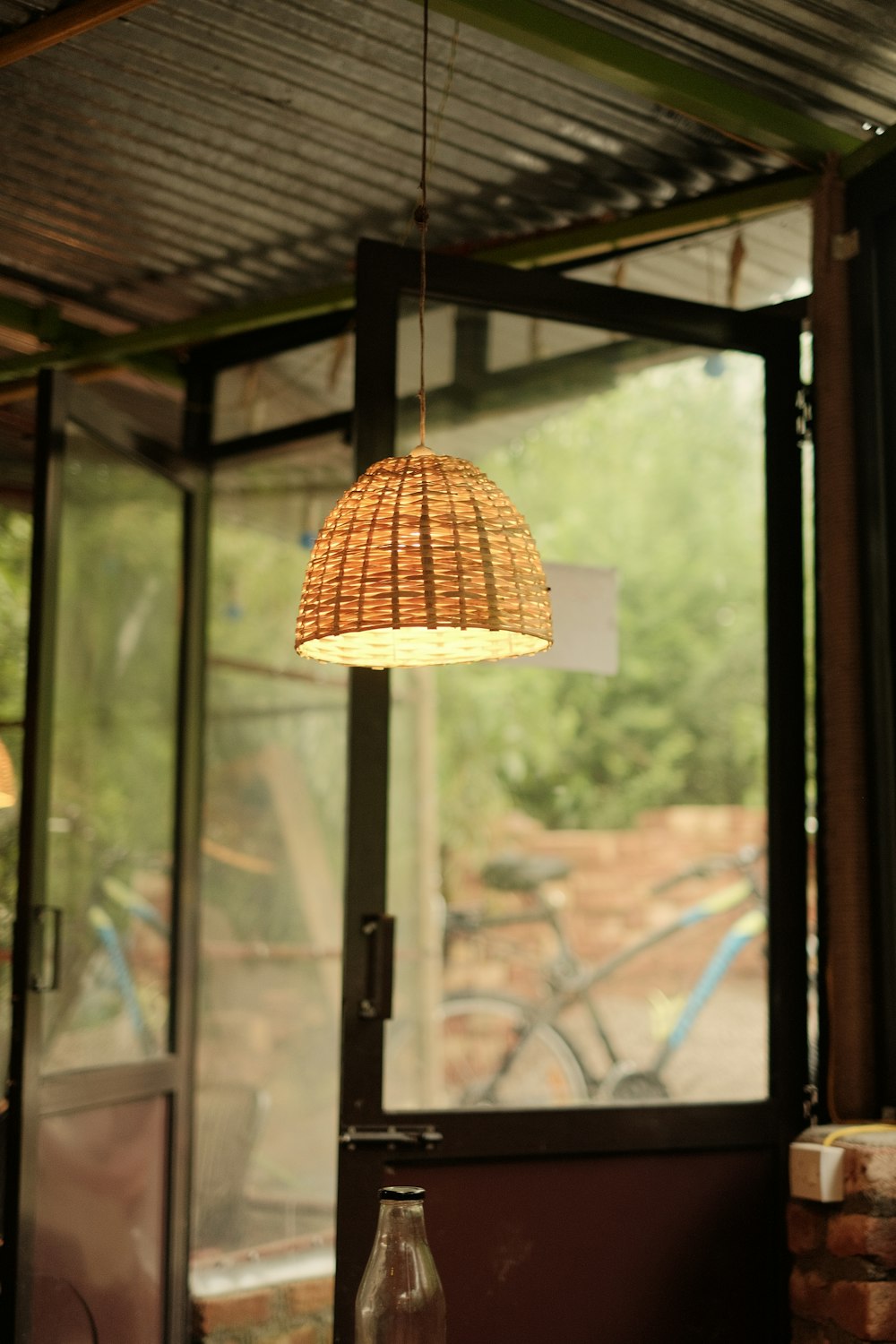 a lamp hanging from a ceiling in a room