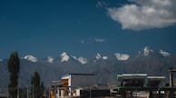 The solar power system with panels gleaming under a clear mountain sky.