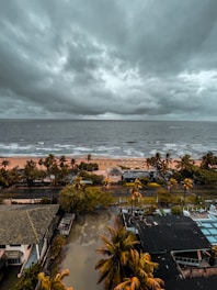 an aerial view of a beach and a body of water