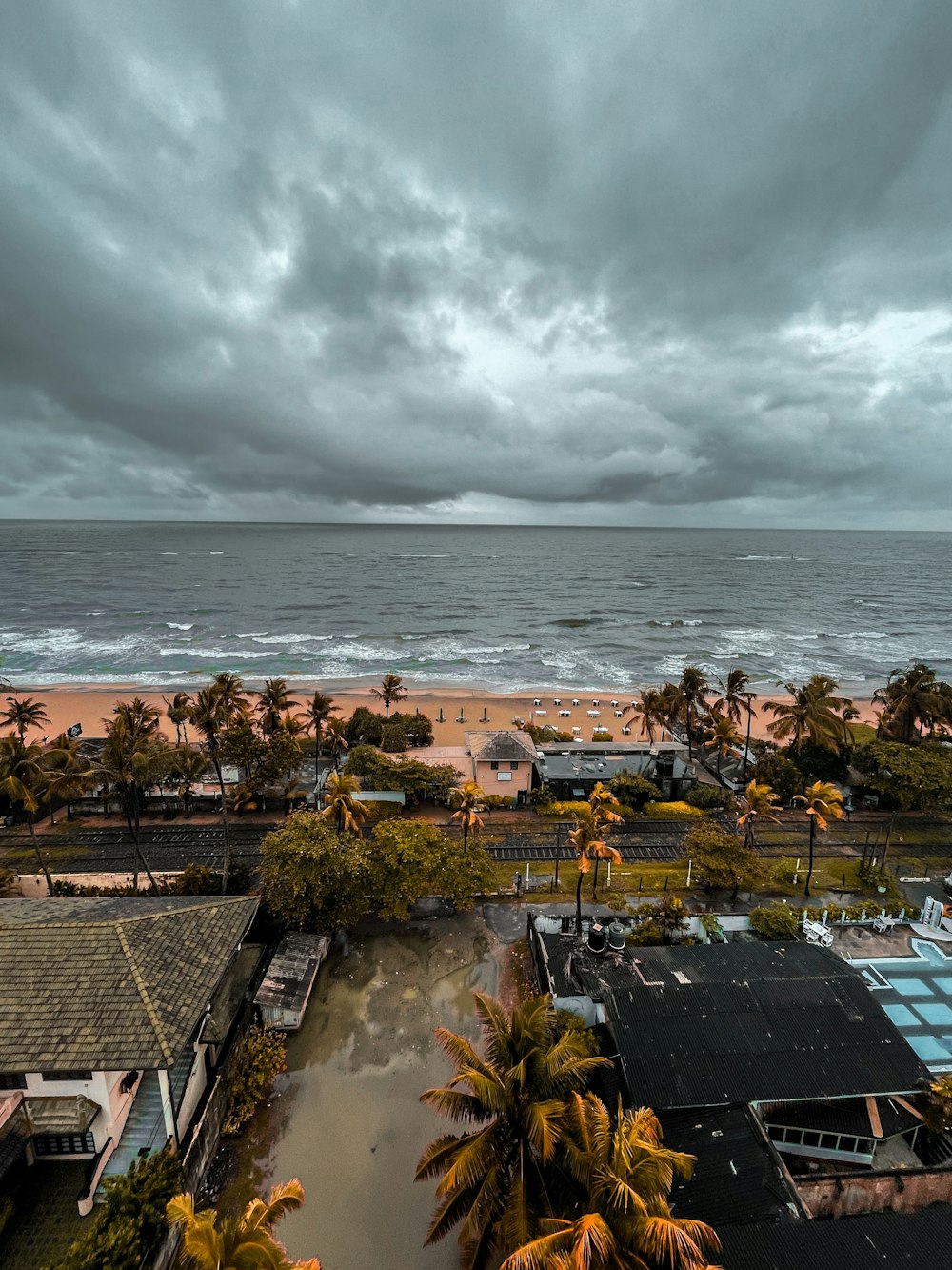 an aerial view of a beach and a body of water