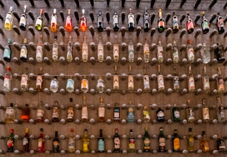 A vibrant display of various liquor bottles arranged elegantly.