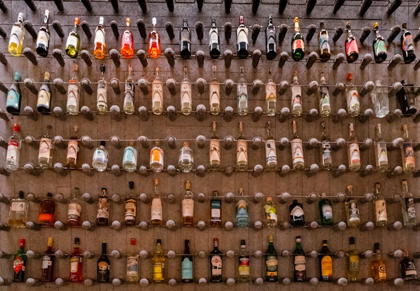 A vibrant display of various liquor bottles arranged elegantly.