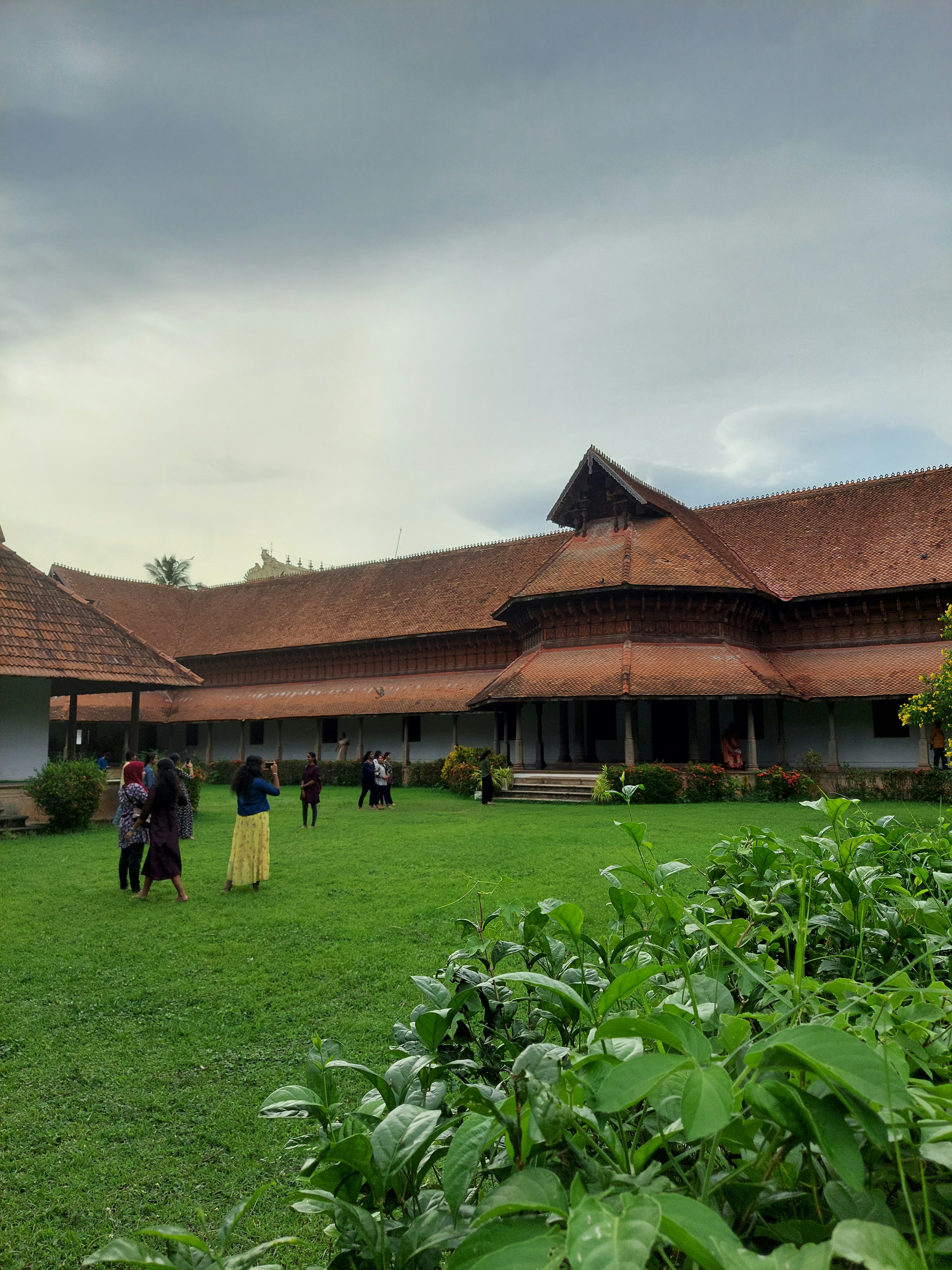 a group of people standing in front of a building