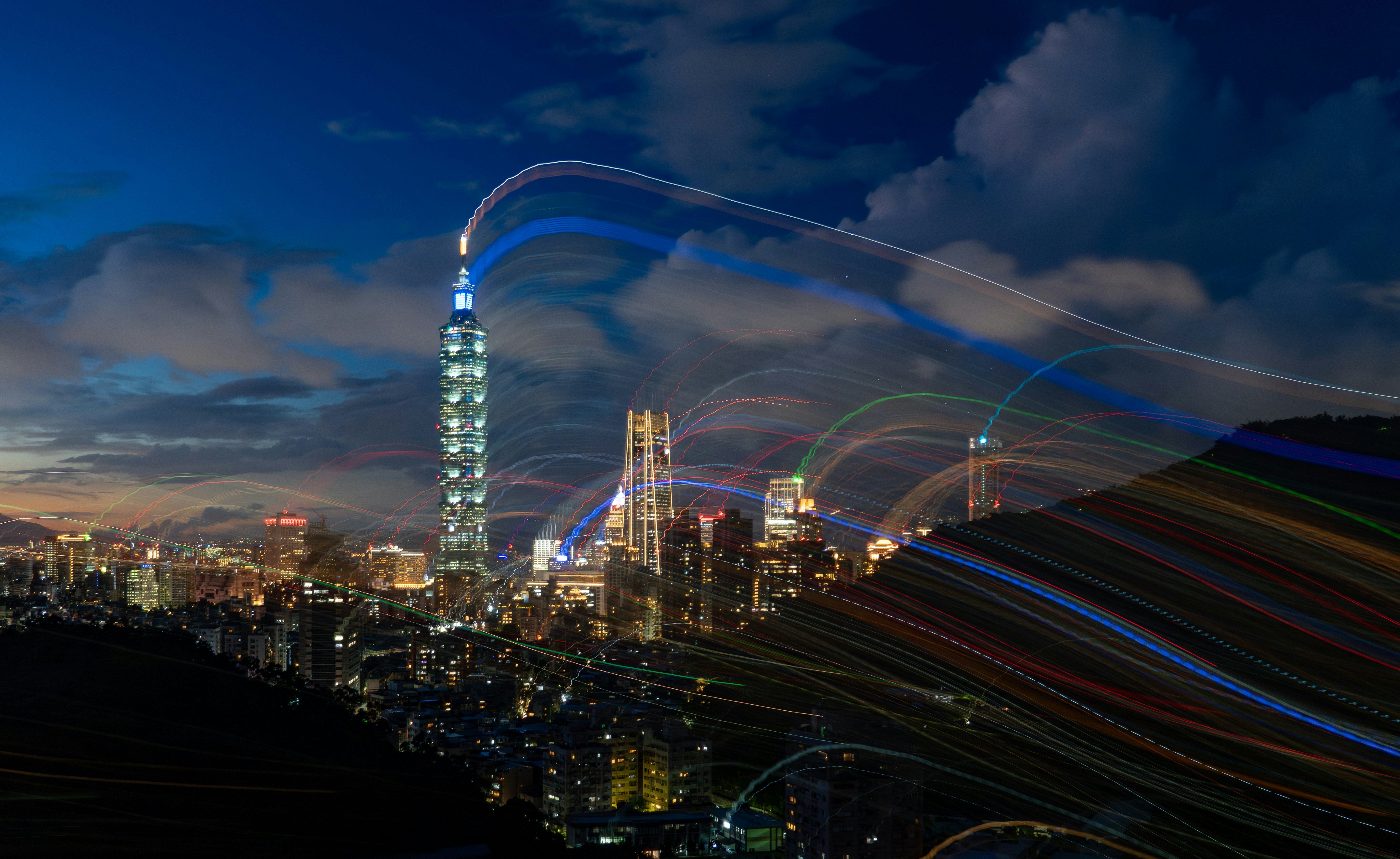 a view of a city at night with a lot of lights