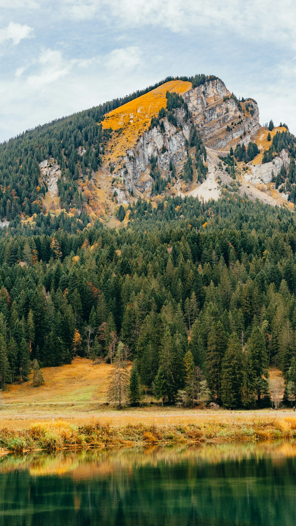 a mountain with a lake in front of it