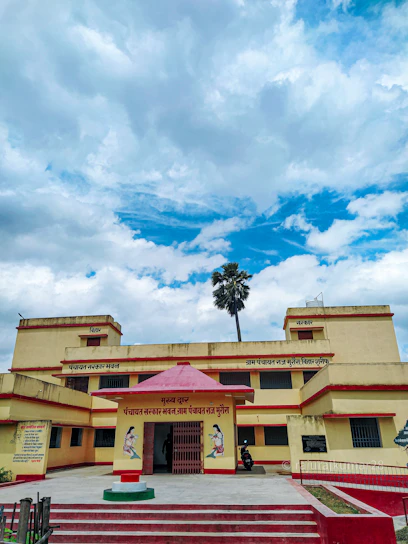 Photo of Jaya Singh standing in front of the Ayush & Jaya Enterprises office building.