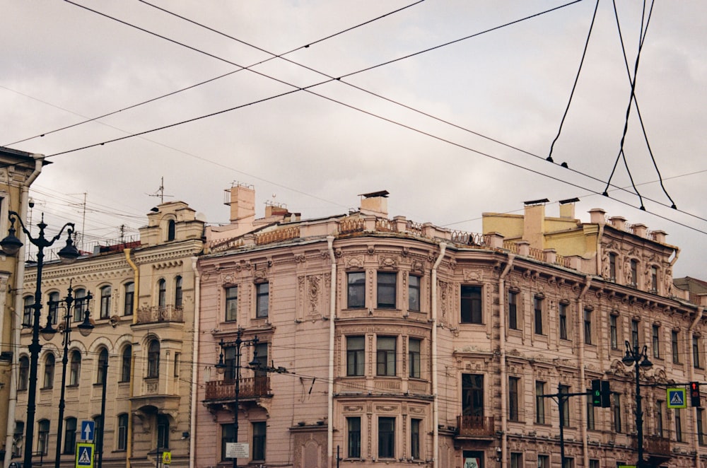 a row of old buildings on a cloudy day