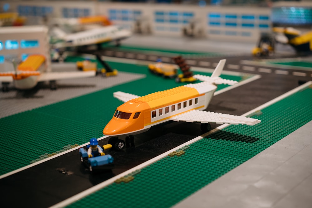 a lego model of a passenger jet on a runway